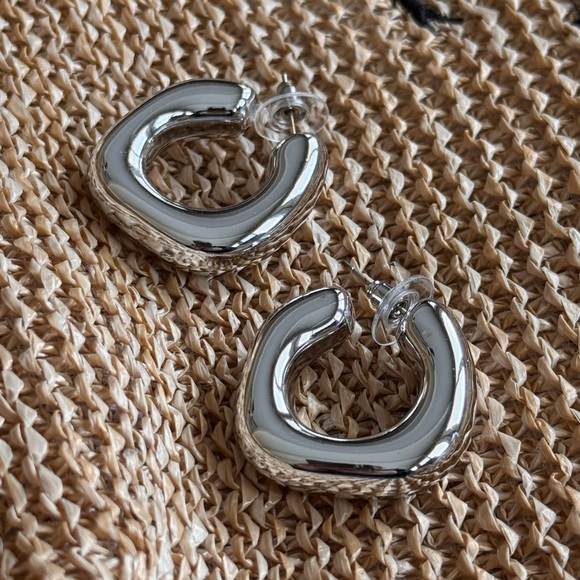 Lightweight puffy post earrings in silver tone - Picture 2 of 3